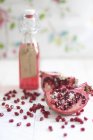 Bottle of pomegranate juice — Stock Photo