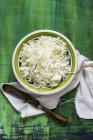 Bowl of sliced white cabbage — Stock Photo