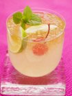 Manhattan with lime and cocktail cherry — Stock Photo