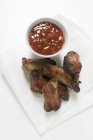 Roasted pork ribs with dip — Stock Photo