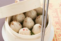 Closeup view of Dim Sum in bamboo steamer — Stock Photo