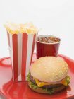 Cheeseburger with potato fries and cola — Stock Photo