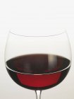 Glass with delicious red wine — Stock Photo
