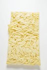 Block of raw noodles — Stock Photo