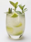 Mojito with lime and fresh-cut mint — Stock Photo