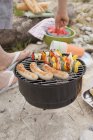 Barbecue on a river bank over ground outdoors during daytime — Stock Photo