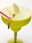 Frozen Margarita with lime wedges — Stock Photo