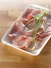 Slices of boiled ham and fresh chives — Stock Photo