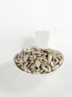Spoonful of sunflower seeds — Stock Photo