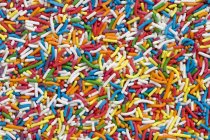 Closeup full-frame view of colored sprinkles — Stock Photo
