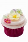 Cupcake with coloured sugar — Stock Photo