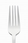 Closeup view of a one fork on a white background — Stock Photo