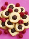 Biscuits with chocolate and raspberries — Stock Photo