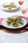 Oysters au gratin in white plate — Stock Photo