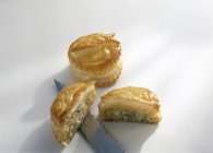 Whole and halved Trout vol-au-vent pastries — Stock Photo