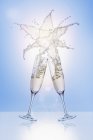 Clinking glasses of sparkling wine — Stock Photo