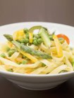 Ribbon tagliatelle pasta with vegetables — Stock Photo
