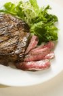 Partially Sliced Steak — Stock Photo