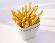 Potato fries in stacked pots — Stock Photo
