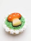 Cupcake with agaric mushroom — Stock Photo