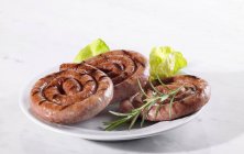 Roasted Coiled sausages — Stock Photo