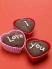 Heart-shaped chocolate muffins — Stock Photo