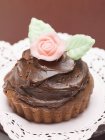 Chocolate cake with rose — Stock Photo