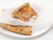 Slice of salami pizza — Stock Photo