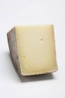 Stück Manchego-Käse — Stockfoto
