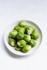Brussels sprouts on plate — Stock Photo
