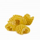 Several pieces of armoniche pasta — Stock Photo