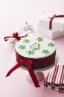 Elevated view of fruit cake with icing for Christmas — Stock Photo