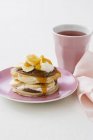 Pikelets with chocolate and spread — Stock Photo