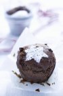 Muffin topped with an icing sugar star — Stock Photo