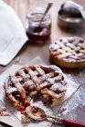 Closeup view of shortcrust pastry tarts with plum jam — Stock Photo