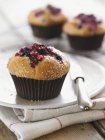 Berry muffins in paper cases — Stock Photo