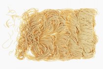 Raw Chinese egg noodles — Stock Photo