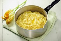 Saffron risotto in pan — Stock Photo