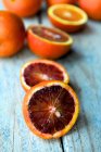 Halved blood oranges — Stock Photo