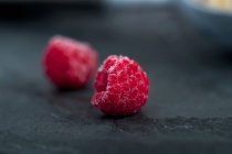 Ripe frozen raspberries — Stock Photo