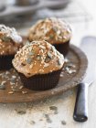 Wholegrain muffins with seeds — Stock Photo
