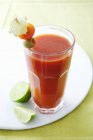 Glass of tomato juice — Stock Photo