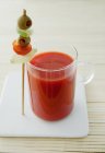 Glass of tomato juice — Stock Photo