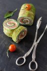 Spinach and basil salmon wrap — Stock Photo