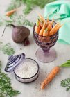 Fresh carrots and arborio rice — Stock Photo