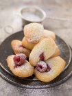 Madeleines with raspberry jam — Stock Photo