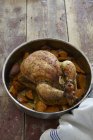Whole roasted chicken with vegetables — Stock Photo