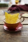 Tortilla chips in soup cup — Stock Photo