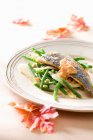 Sea bass with green beans — Stock Photo