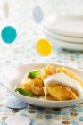 Potato fritters with sauce — Stock Photo